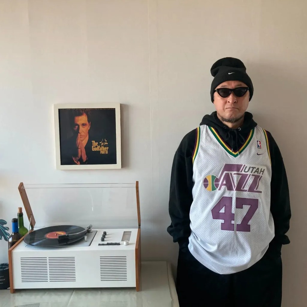 Mr. OK's father in a vintage-inspired outfit, styled by the renowned Korean fashion curator Mr. OK.