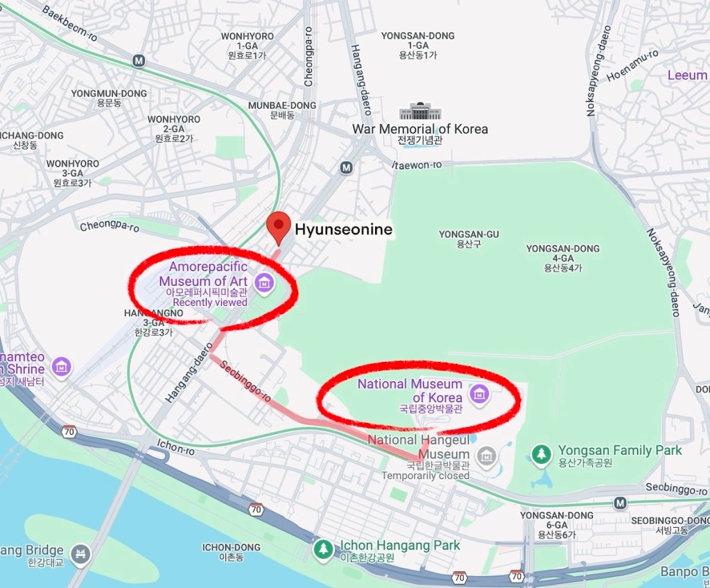 Exterior of Amorepacific building with Osulloc tea house near Yongsan station